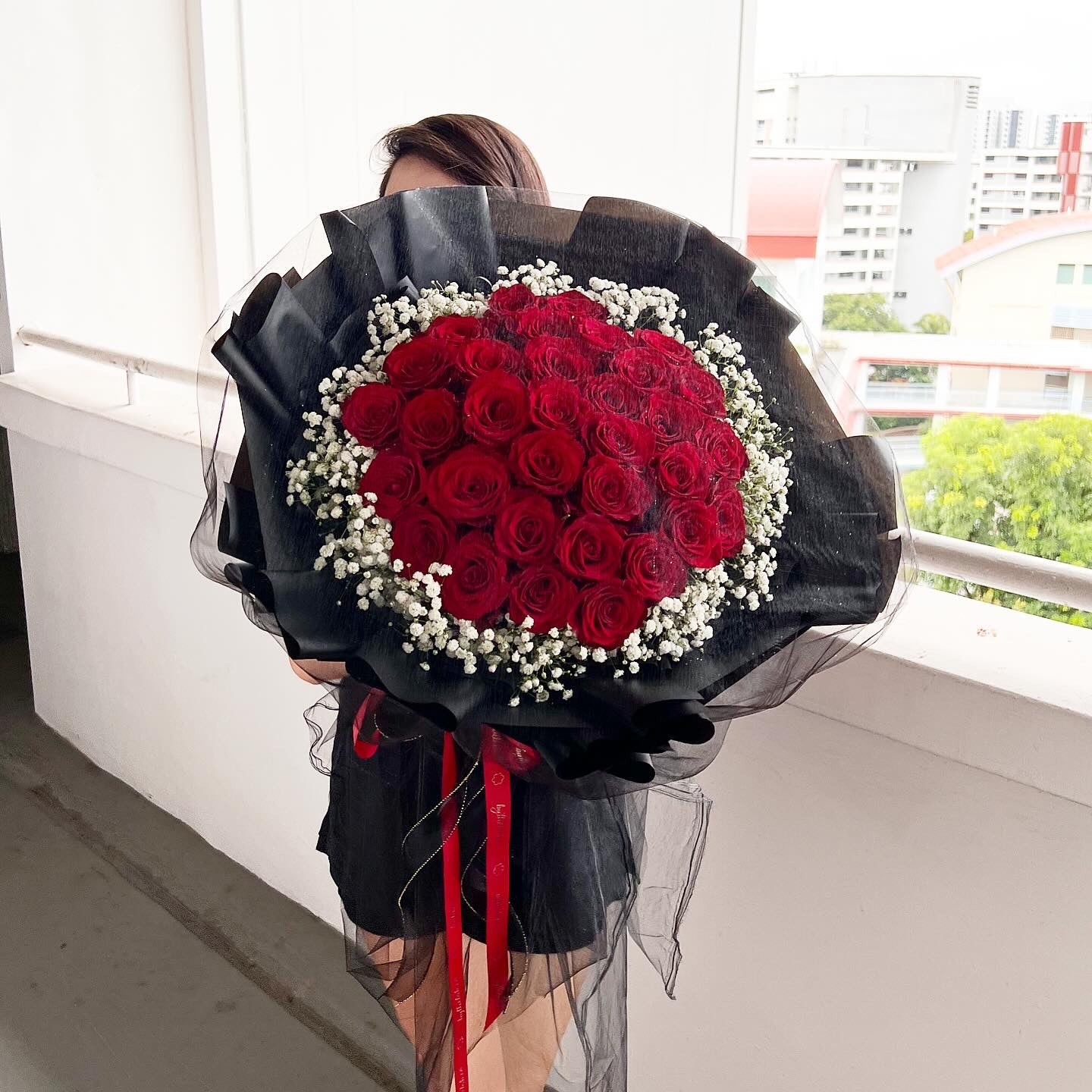 33 Stalks Fresh Red Roses with Babybreath in Dreamy Black Bouquet