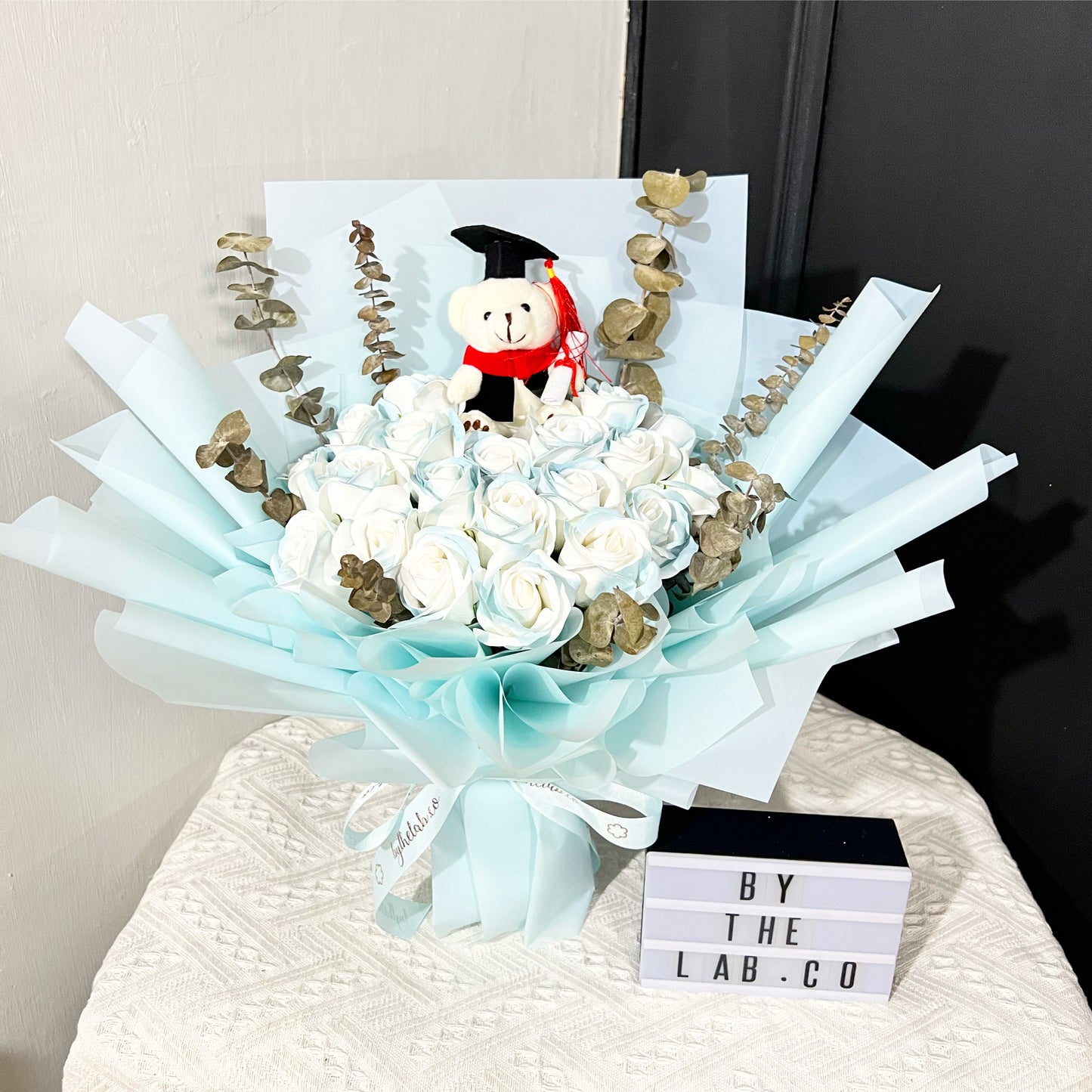 Graduation Bear with Soap Roses Bouquet in Candy Blue Wrapper - Aurora Blue Roses